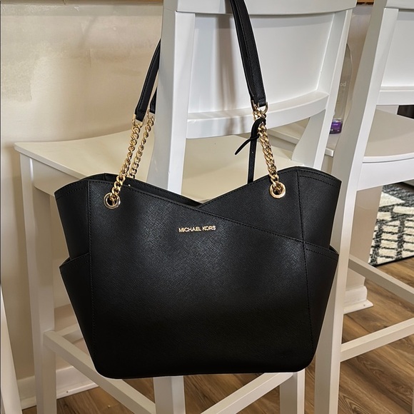 Michael Kors Handbags - Michael Kors Black and Gold Tote with Chain Accents